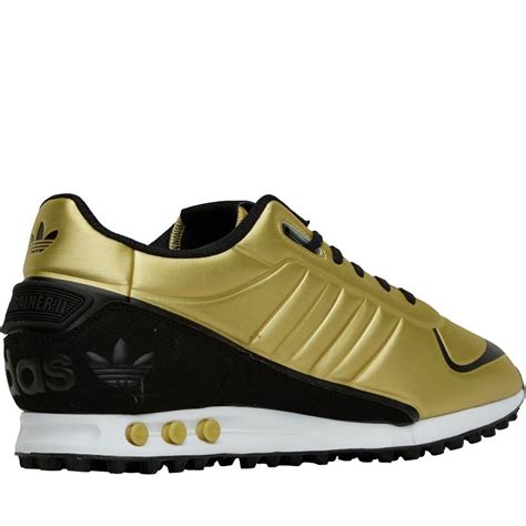 adidas la trainer schwarz gold|adidas originals la trainer.